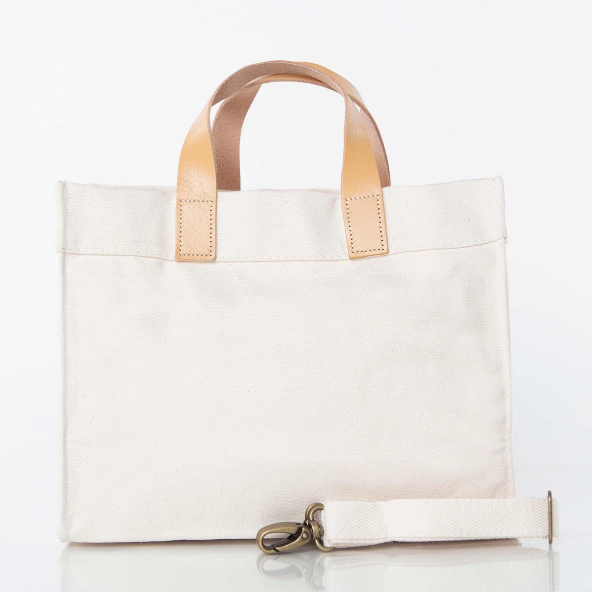 Front view of Crossbody Canvas Utility Bag with Brown Leather Handles & Adjustable Strap